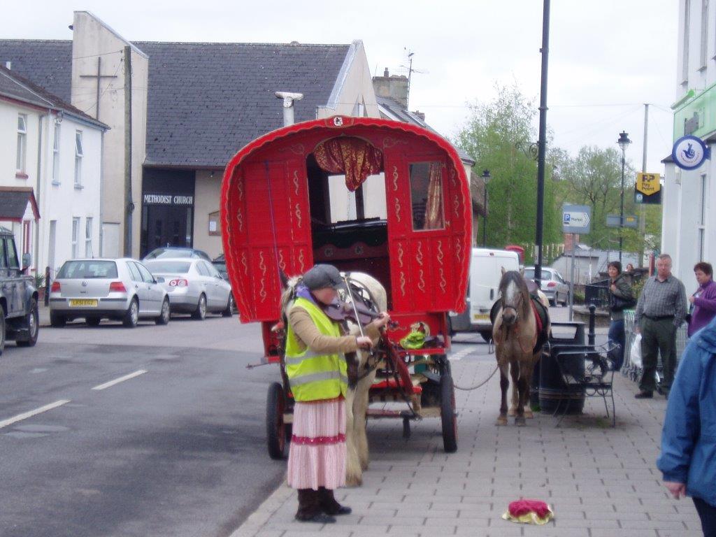 Gypsy busking by the Coop in Hatherleigh